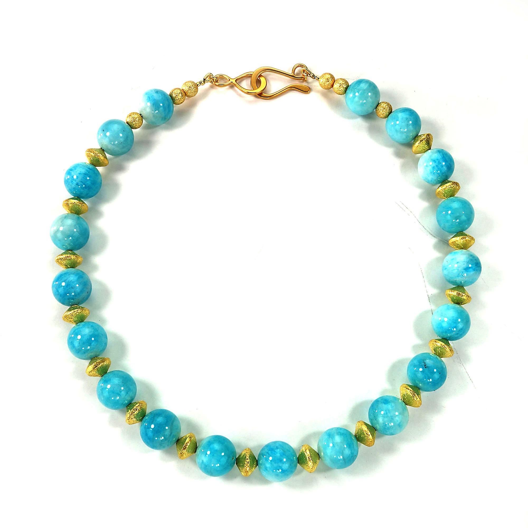 Necklace of 12 MM highly polished Amazonite enhanced with gold tone spacers and 24K gold vermeil hook and eye.  This lovely Amazonite Choker caresses your neck and whispers 'Spring' in your ear.  This handmade necklace is a 16 inch choker length. 
