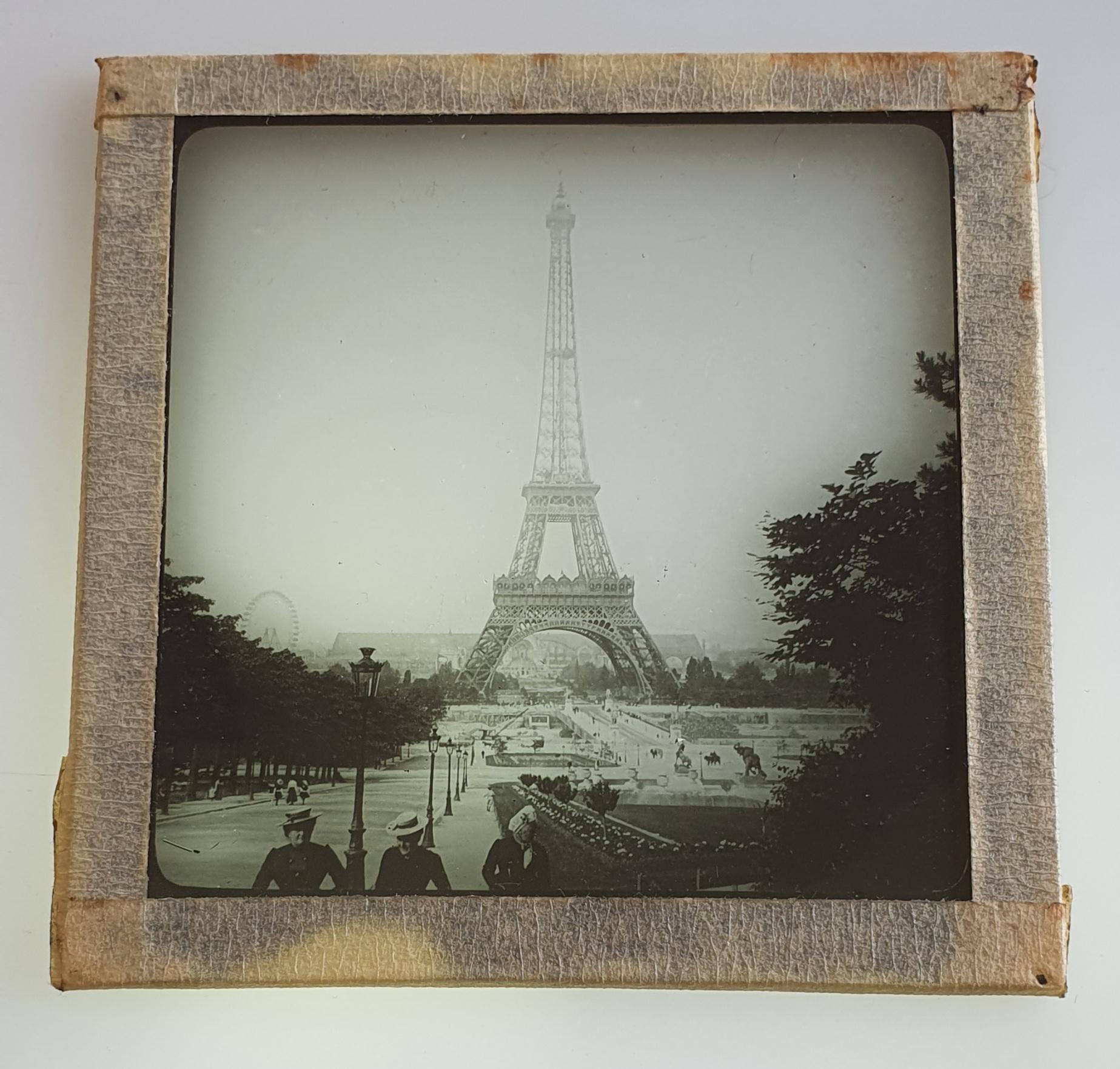 16 Antique glass lantern slides with motifs of France.

1. Paris, Eiffel Tower. With three people in the front of the photo.
2. Paris, Eiffel Tower. View from the lake with boat in front of the photo.
3. Paris, Arc de Triomph. Has a scratch, see