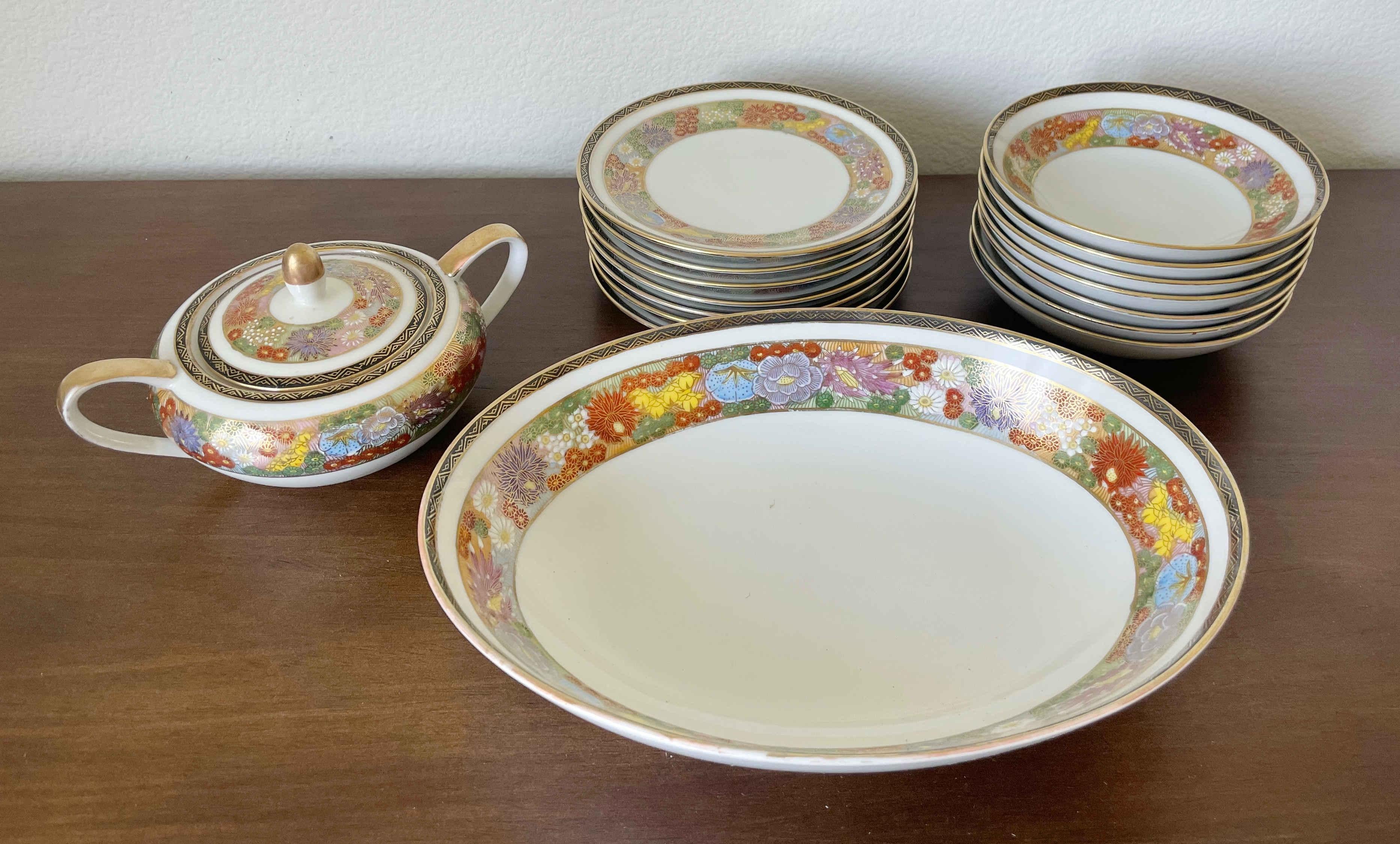 Vintage Koshida sumatsu serving set hand painted in floral pattern / Made in Japan circa 1960s
1 sugar bowl, width 7 inches, height 5 inches, depth 4 inches
1 oval platter, width 10.5 inches, depth 7.5 inches
7 plates, diameter 6.25 inches
7 bowls,