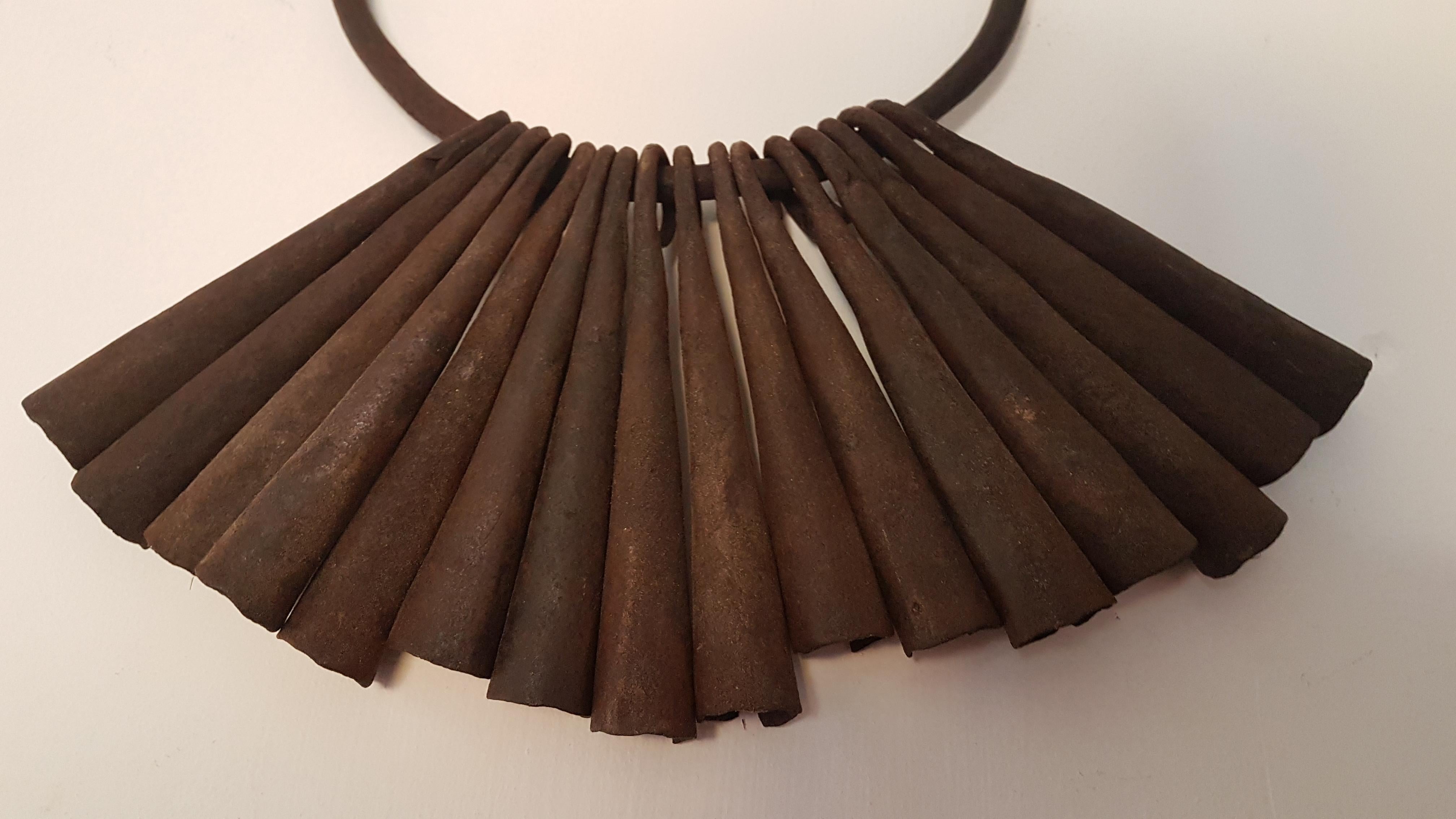 An excellent and unusual early 20th century tribal currency item that has 16 individual gongs on a large iron hoop. Displays well and can be hung anywhere, measures 30cm high from top to bottom, average gong height is 13cm with the hoop diameter
