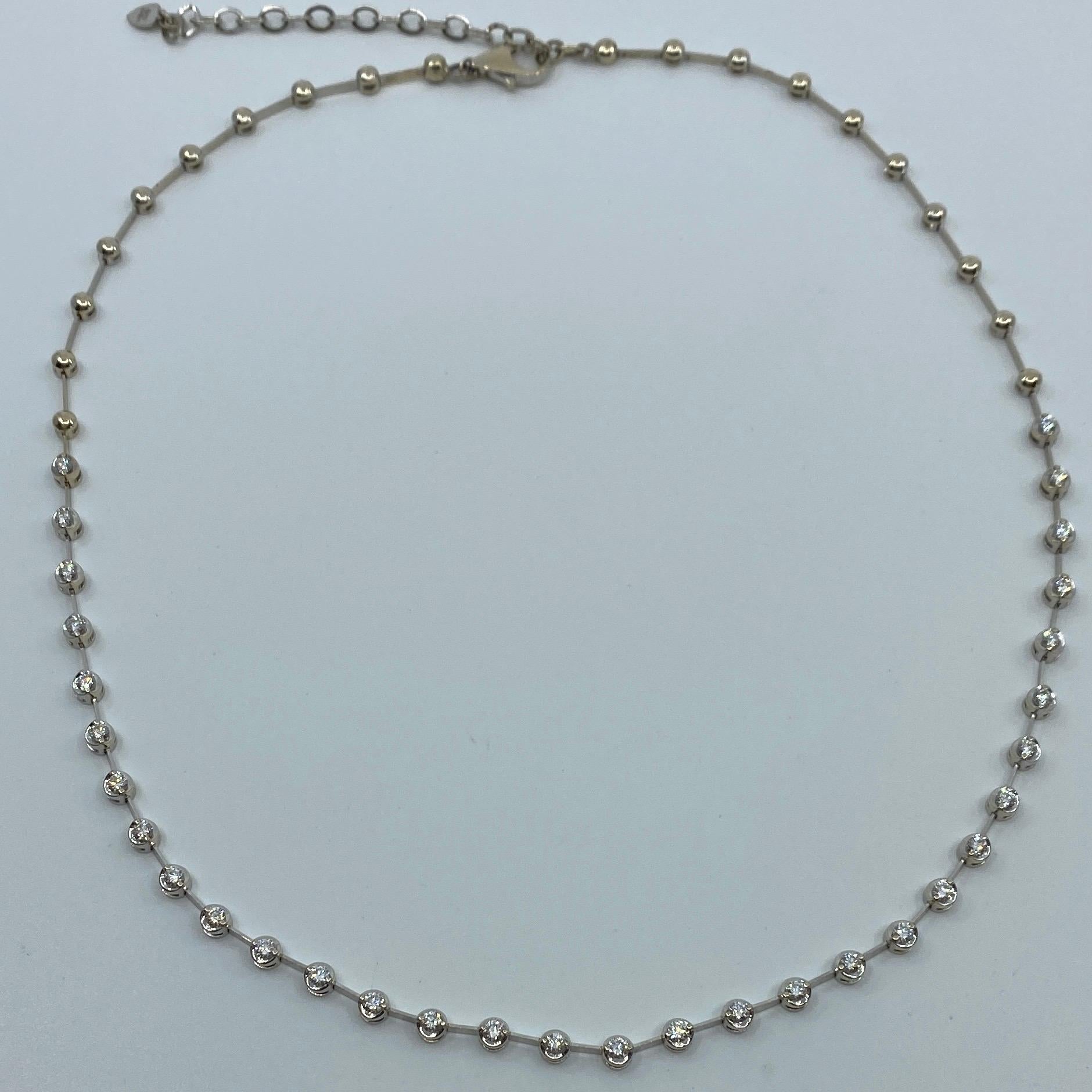 18 Karat White Gold Natural Diamond Line Necklace.

1.60 total carat of diamonds measuring 2.5mm Si1/2 clarity G/H colour. 32 stones total.

Set in a beautiful 18k white gold line necklace.

Measures 18' and weighs 16.1g

Necklace is brand new and