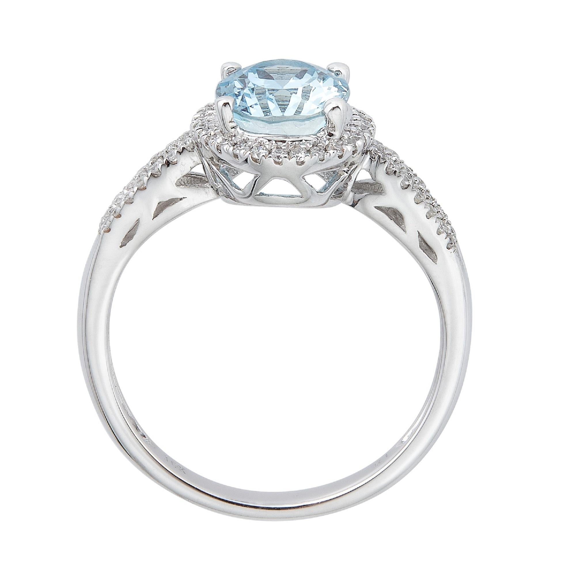 diamond ring with aquamarine accents