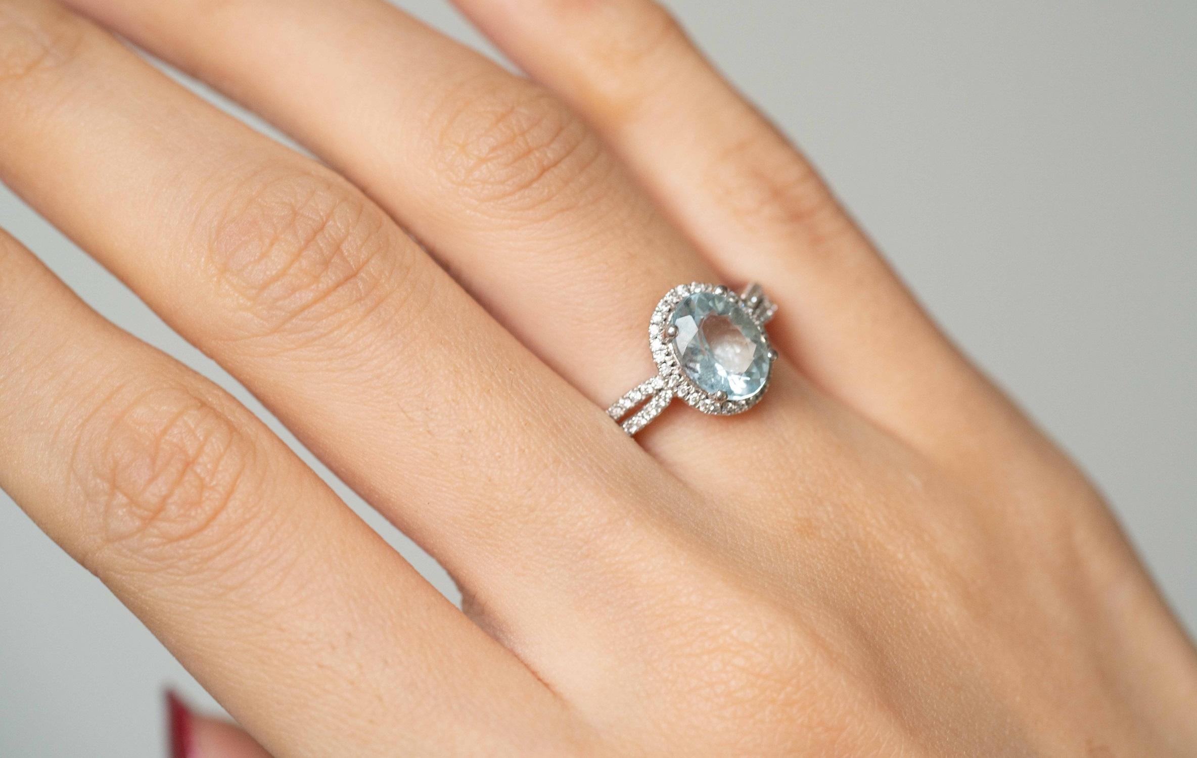 Stunning, timeless and classy eternity Engagement ring. Decorate yourself in luxury with this Gin & Grace ring. This ring is made up of 7X9 Oval-Cut Prong Setting Aquamarine (1 pcs) 1.60 Carat and Round-Cut Prong Setting Diamond (56 pcs) 0.21 Carat