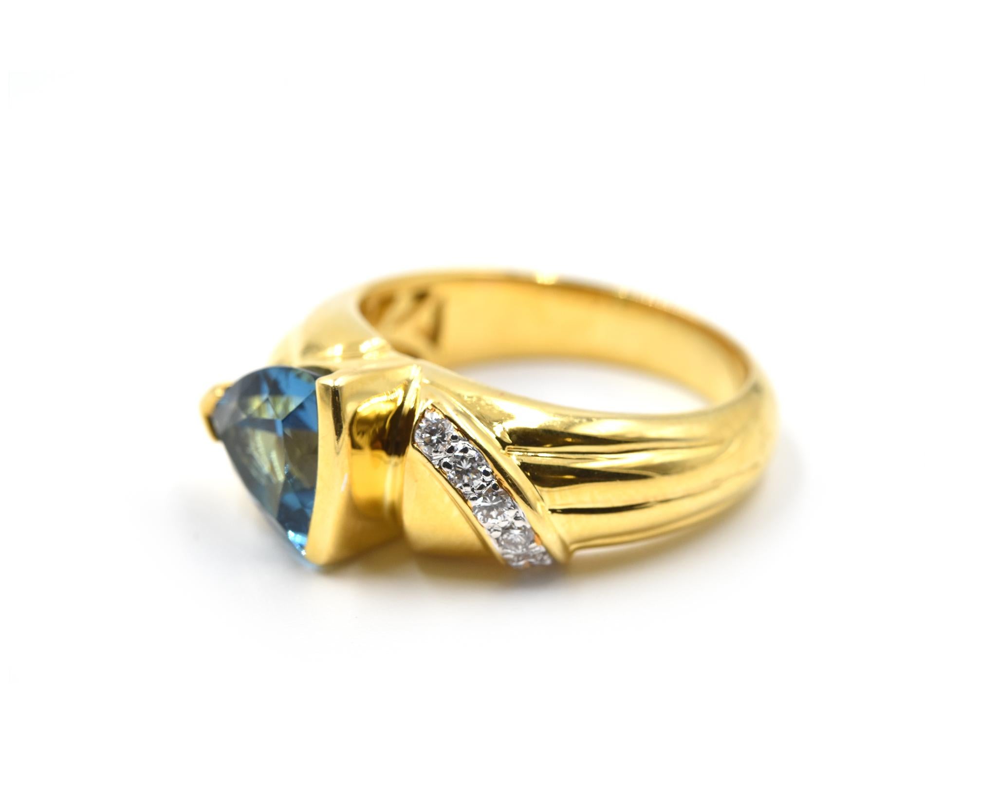 Trillion Cut 1.60 Carat Blue Topaz and Diamond Ring 18 Karat Yellow Gold For Sale