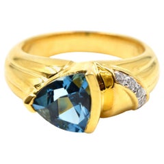 1.60 Carat Blue Topaz and Diamond Ring 18 Karat Yellow Gold