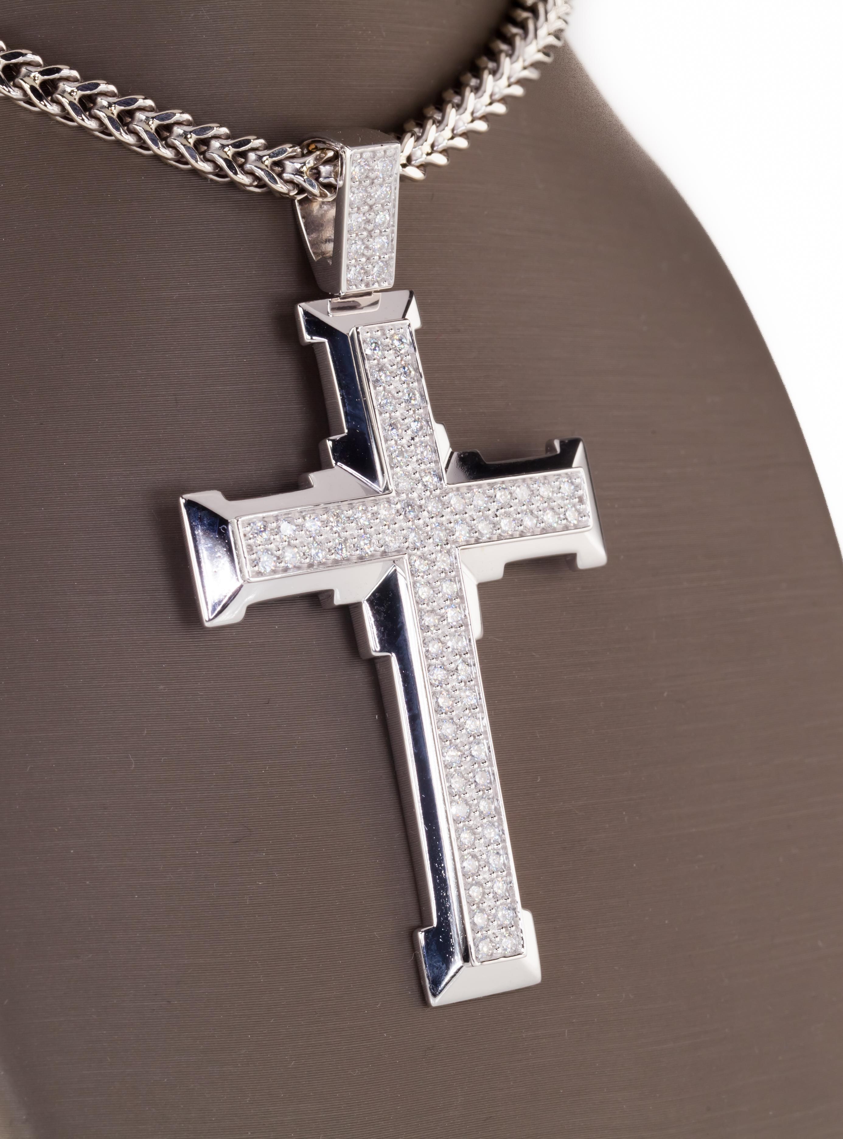 Gorgeous 14k White Gold Cross Pendant with Chain
Pendant
14k White Gold Cross with Diamond Accents
Round Diamonds are in Pave Settings in Two Rows
Total Diamond Weight = 2 cts
Average Color = F
Average Clarity = VS2
Total Length of Pendant