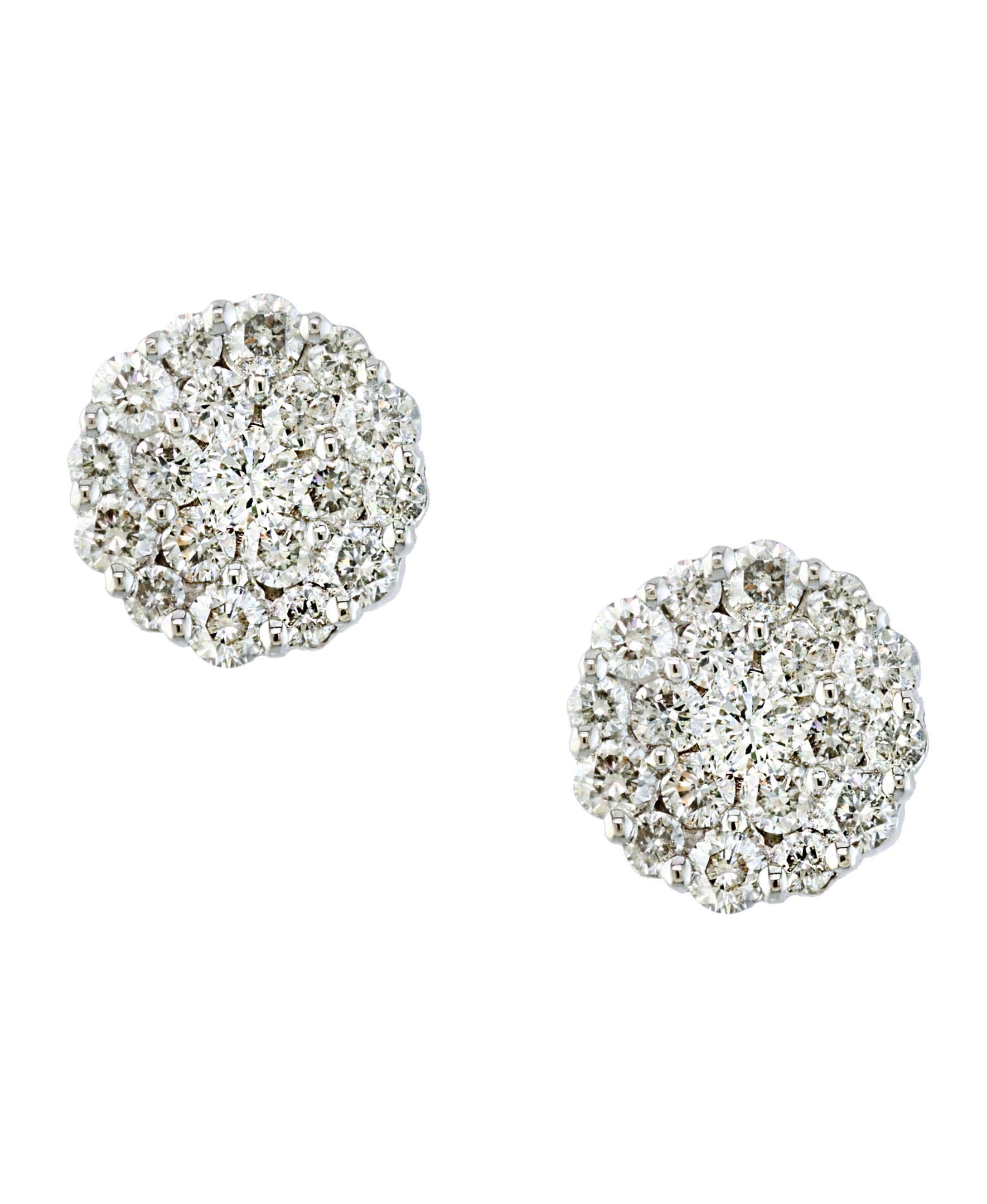 A sweet, shimmery style for any day of the week. These stud earrings blossom floral clusters of   Approximately 1.6 ct. t.w. round brilliant-cut diamonds. Set in 18 kt White gold. Post, diamond floral cluster stud earrings.
It's  a unique and