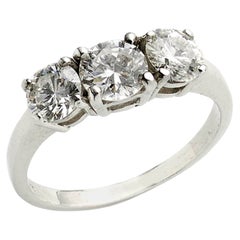 Retro 1.60 Carat Diamond Platinum Three-Stone Ring