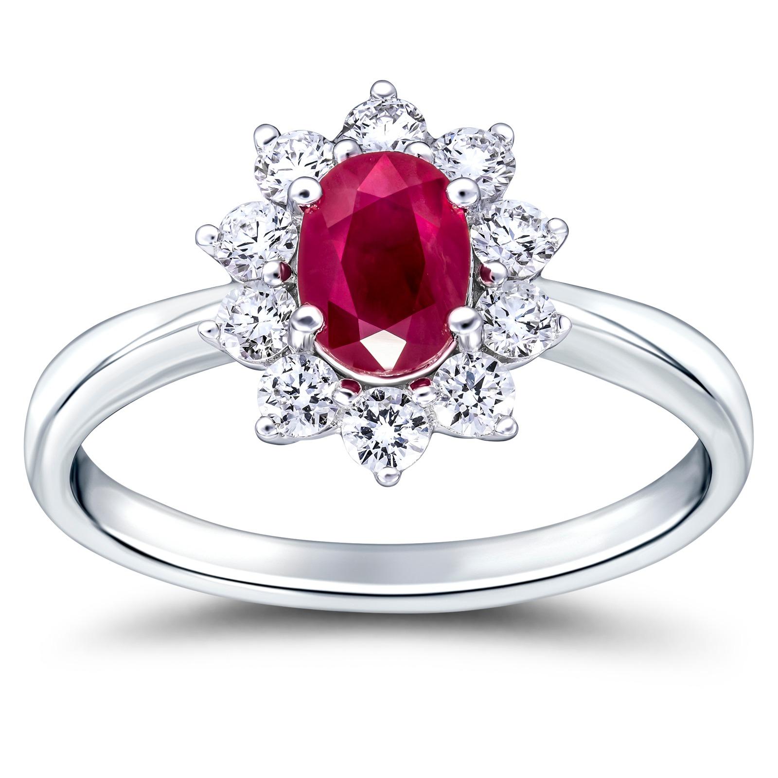 Elegant and striking 1.60 Carat total diamond and ruby Cluster Ring, The radiant oval ruby is surrounded by 10 white stunning white diamonds weighing a total of 0.60 carat color G/H clarity SI, the ruby is 1.00 carat in weight 7x5 mm. The ring is