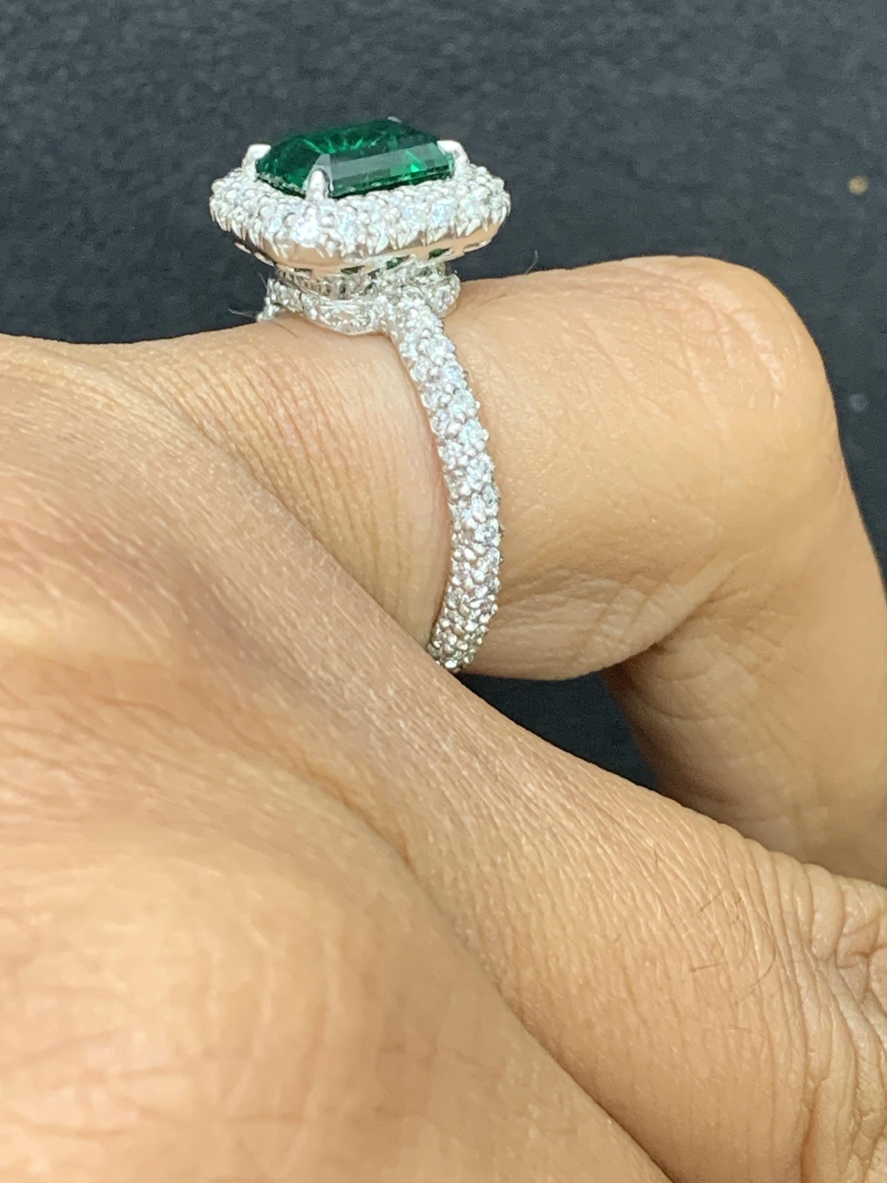 1.60 Carat Emerald Cut Emerald and Diamond Engagement Ring in Platinum In New Condition For Sale In NEW YORK, NY