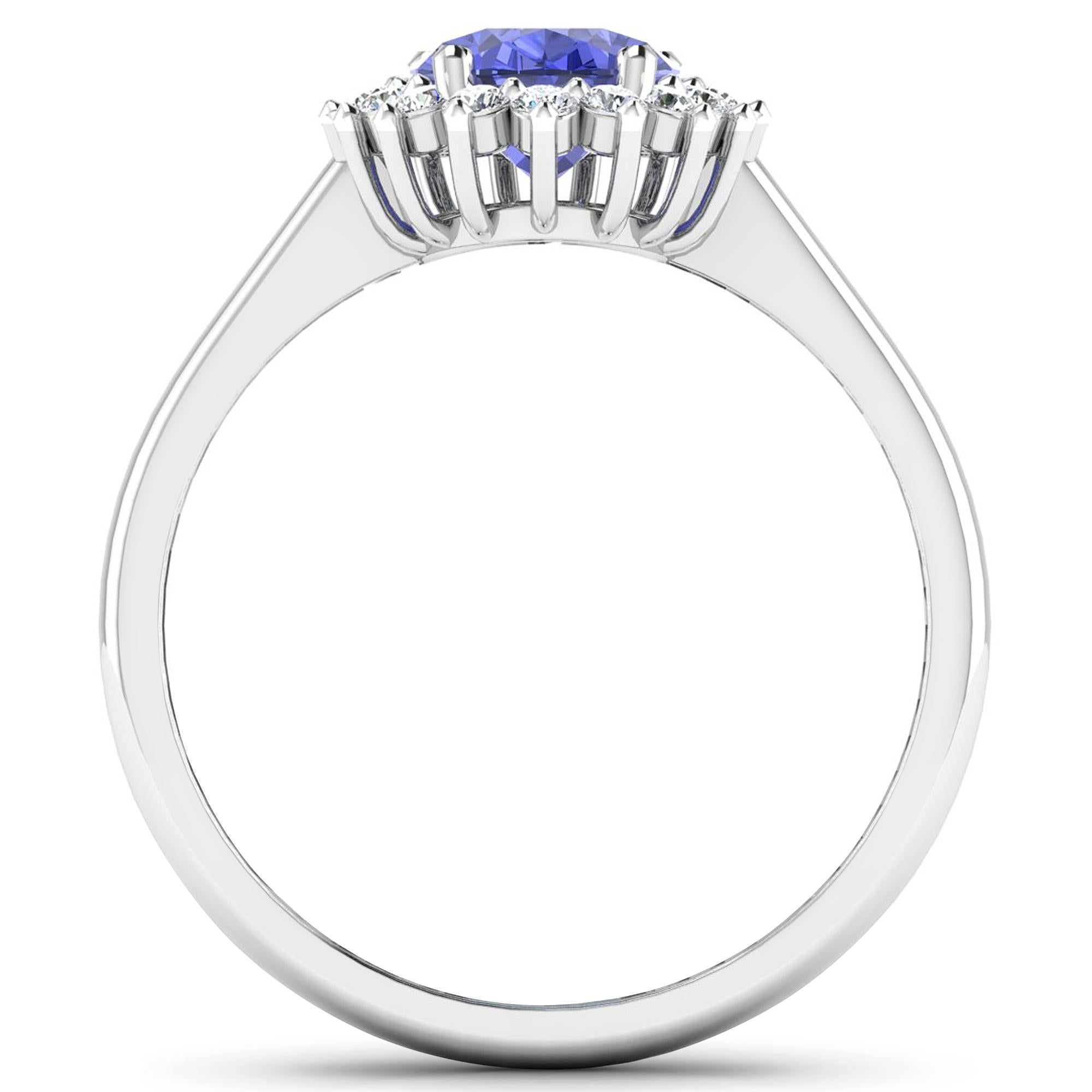 14Kt Gold Tanzanite & Diamond Engagement Ring, 1.80ctw

Center Stone Details:
Stone: Tanzanite
Shape: Oval
Size: 9x7mm
Weight: 1.60 carat

Diamond Details:
Shape: Round Brilliant (20)
Carat Weight: 0.22 carats
Quality, Color: I1-I2, I

14K White