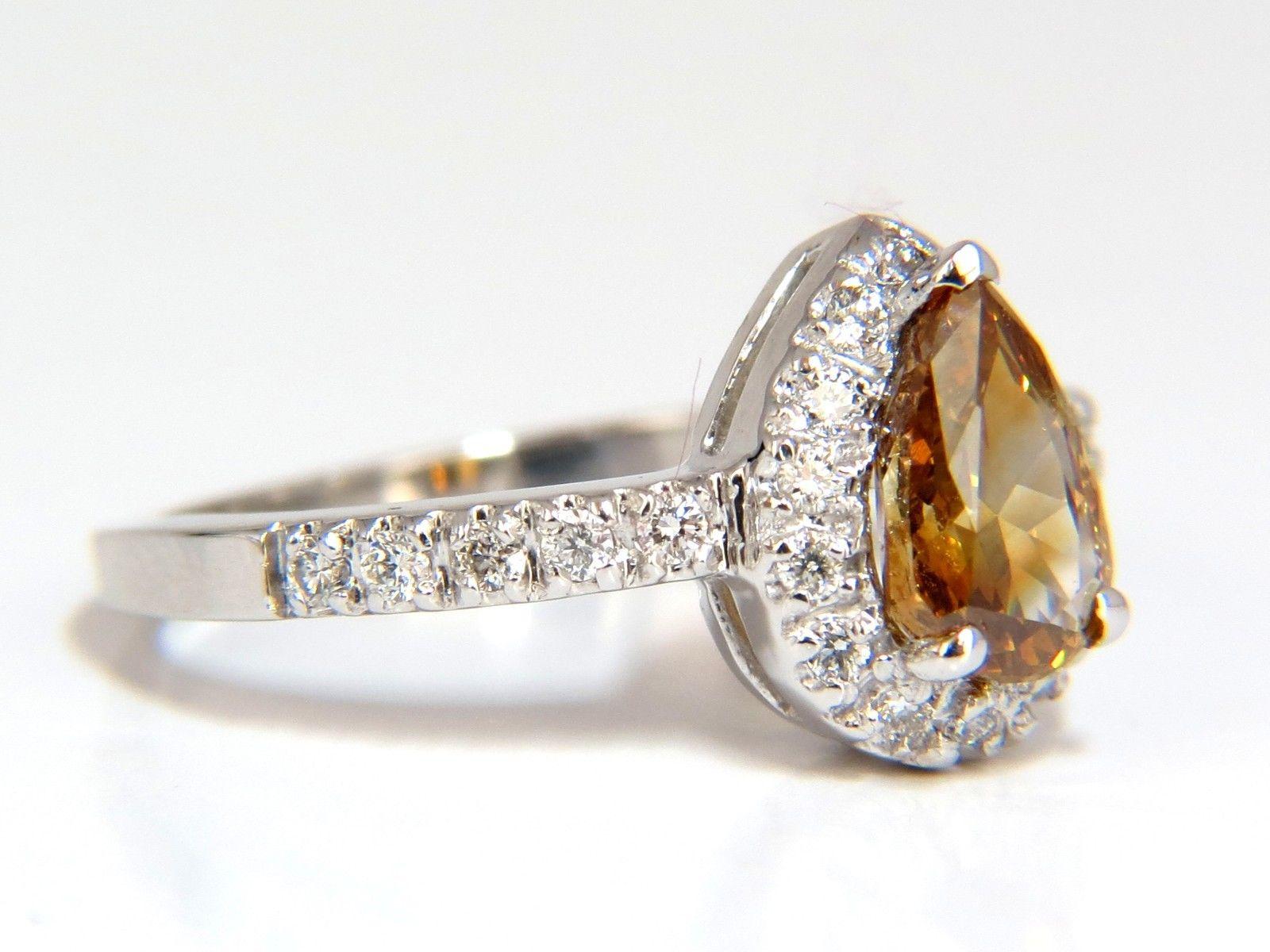 Pear Cut 1.60 Carat Natural Fancy Color Yellow Brown Diamonds Halo Ring 14 Karat For Sale