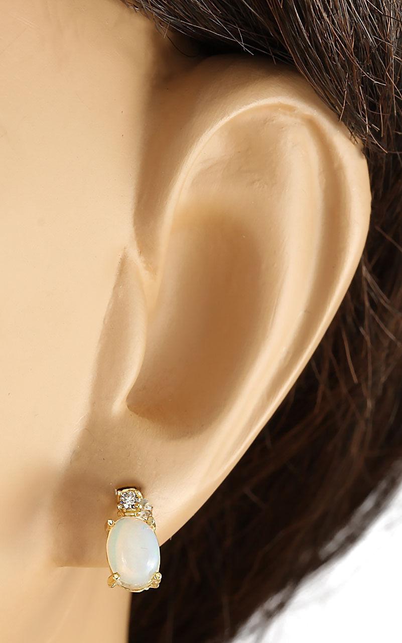 Opal-Diamant-Ohrringe aus 14 Karat Gelbgold  (Ovalschliff) im Angebot