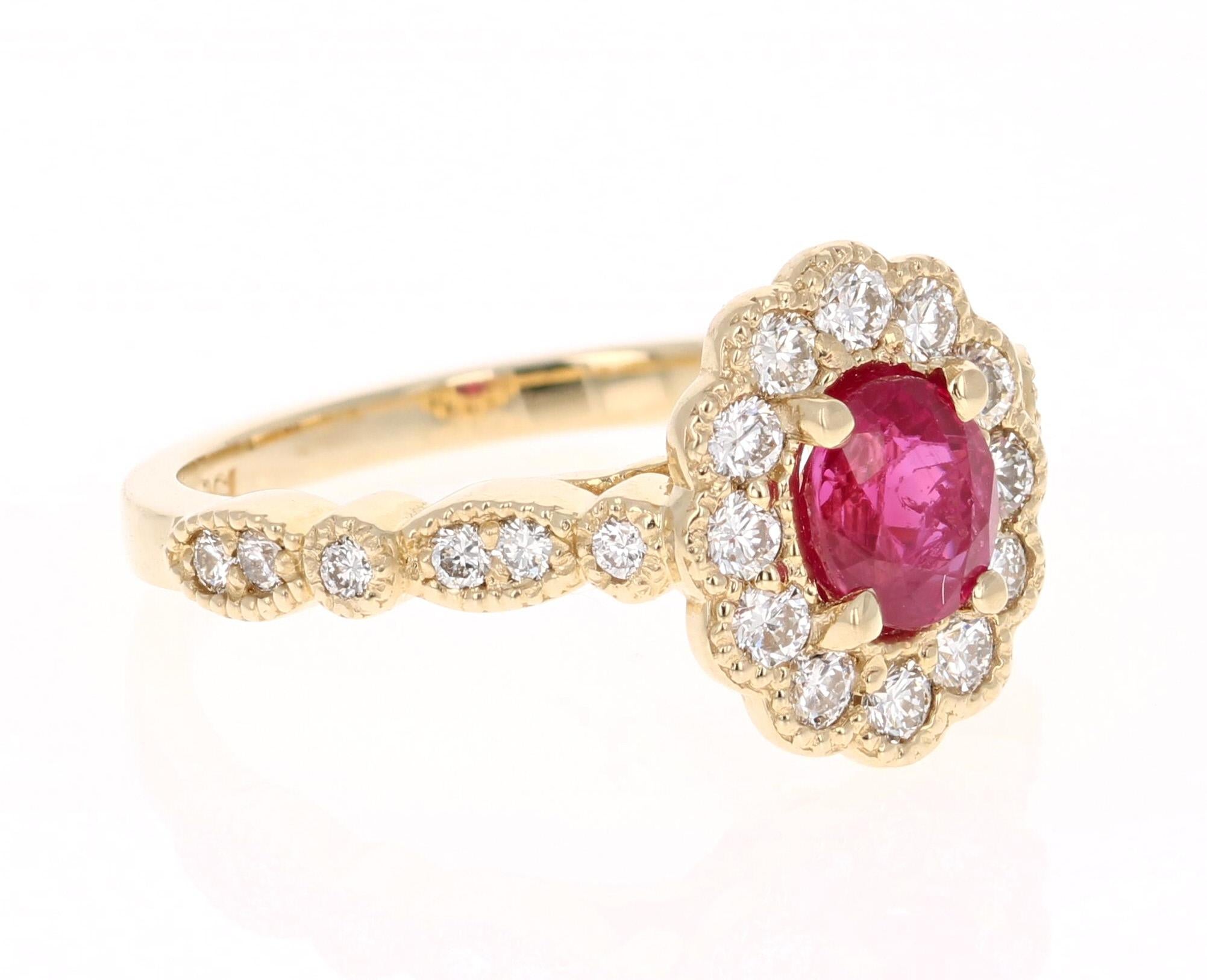 This ring has a 1.02 Carat Oval Cut Burmese Ruby that is set in the center and is surrounded by 24 Round Cut Diamonds that weigh 0.58 carats. The Clarity and Color of the Diamonds is VS2-H.  The total carat weight of the ring is 1.60 carats.

The