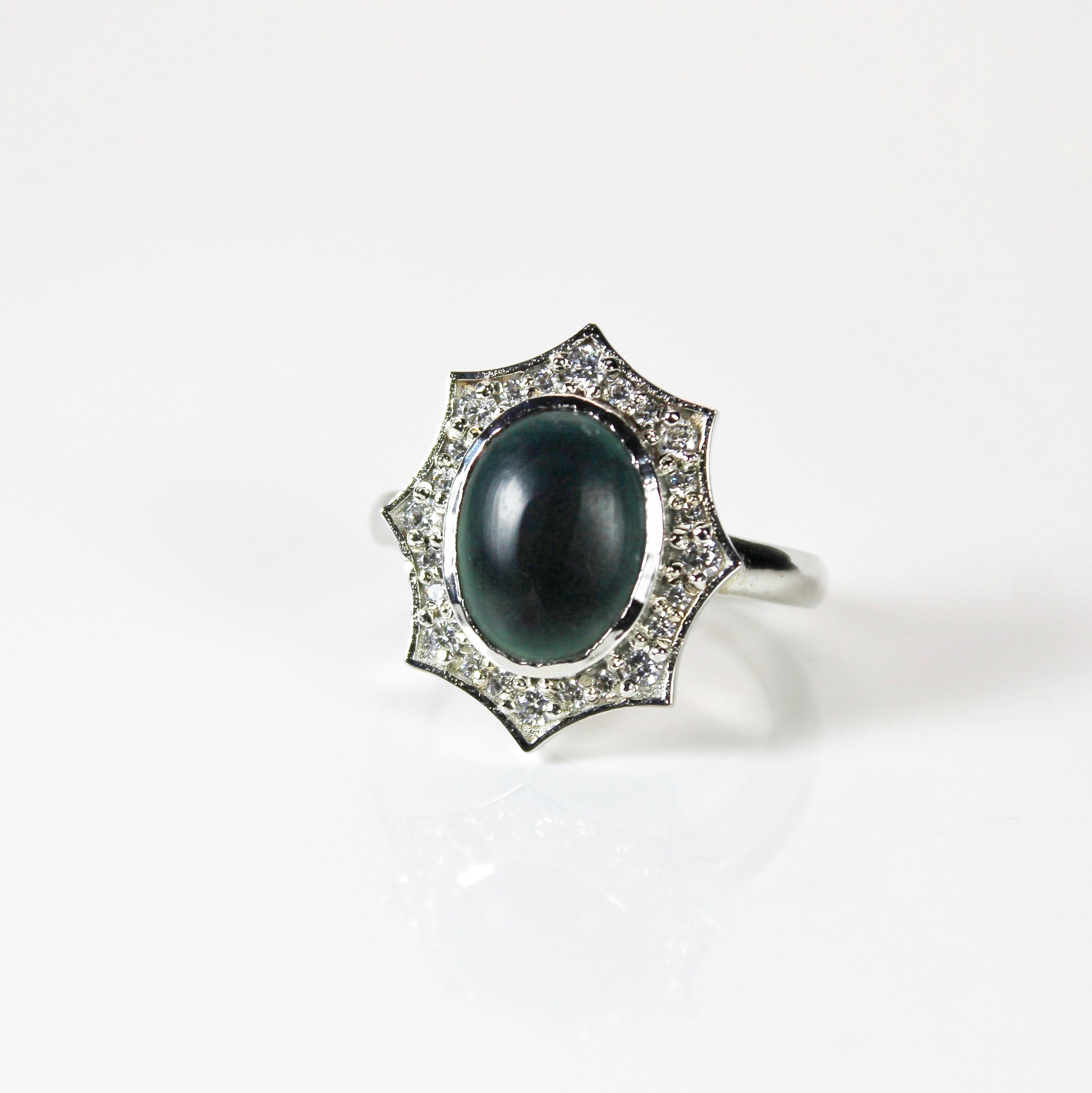 Contemporary 1.60 Carat Oval Cut Dark Green Opal Ring For Sale