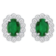 Orecchino con smeraldo ovale da 1,60 carati e diamante aureolato da 0,50 carati in 18W ref449