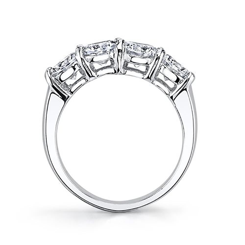 For Sale:  1.60 Carat Round Cut 4-Stone Diamond Band Shared Prong 5