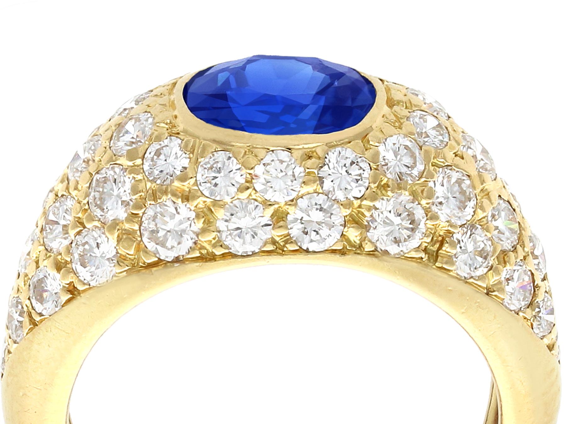 A fine and impressive vintage 1.60 carat blue sapphire and 1.20 carat diamond (total), 18 karat yellow gold dress ring; part of our diverse vintage jewelry and estate jewelry collections

This fine and impressive oval cut sapphire and diamond