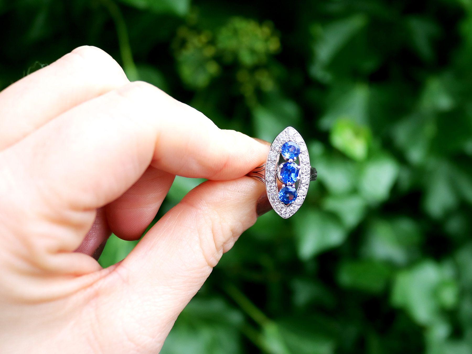 A stunning 1.60 carat sapphire and 1.05 carat diamond, 18 karat white gold marquise shape dress ring; part of our diverse vintage jewelry and estate jewelry collections.

This stunning, fine and impressive vintage sapphire and diamond ring has been