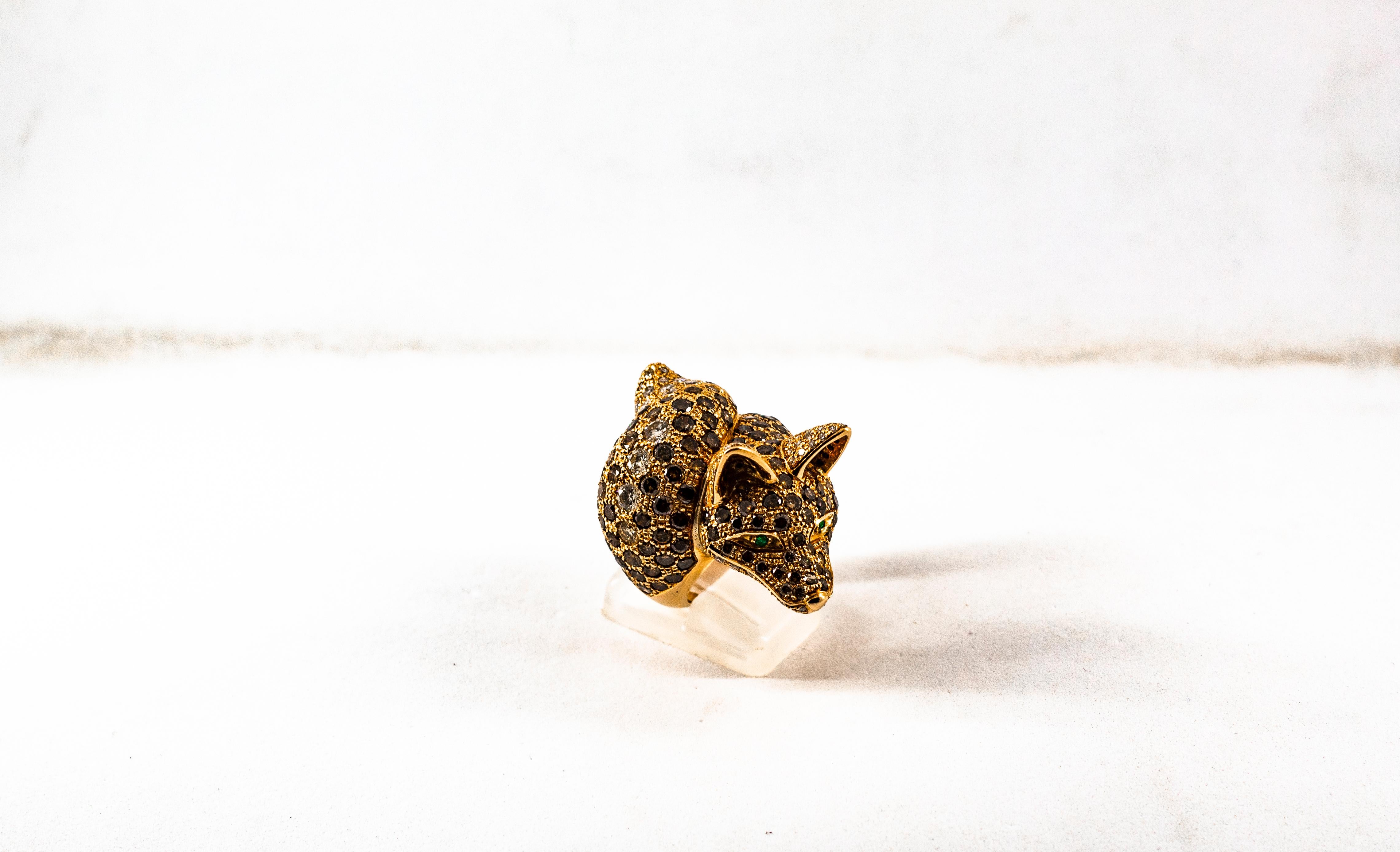 This Ring is made of 14K Yellow Gold.
This Ring has 1.60 Carats of White Modern Round Cut Diamonds.
This Ring has 7.50 Carats of Brown Modern Round Cut Diamonds.
This Ring has 0.04 Carats of Emeralds.
Size ITA: 16 USA: 7.5

We're a workshop so every