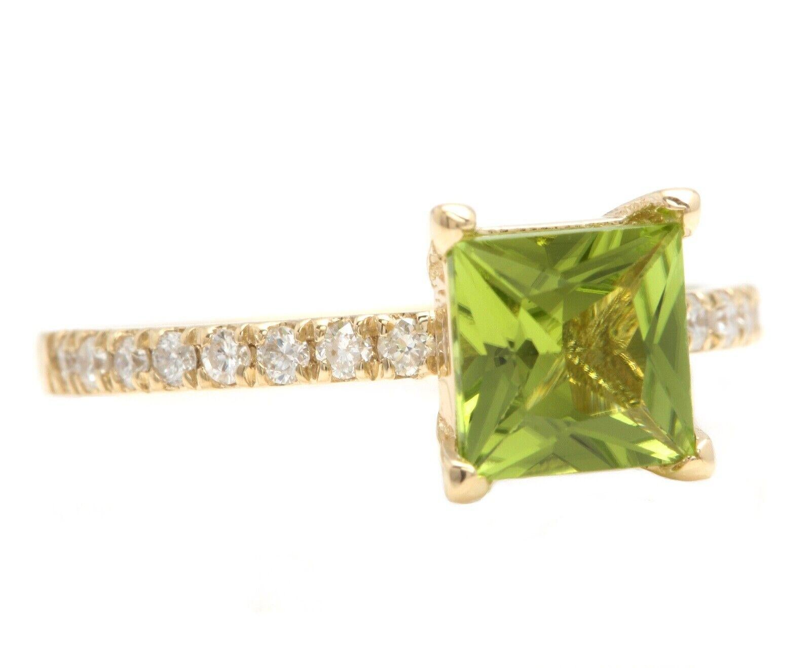 1.60 Carats Natural Very Nice Looking Peridot and Diamond 14K Solid Yellow Gold Ring

Suggested Replacement Value:  $2,500.00

Total Natural Princess Cut Peridot Weight is: Approx. 1.40 Carats 

Peridot Measures: Approx. 6.40 x 6.40mm

Natural Round