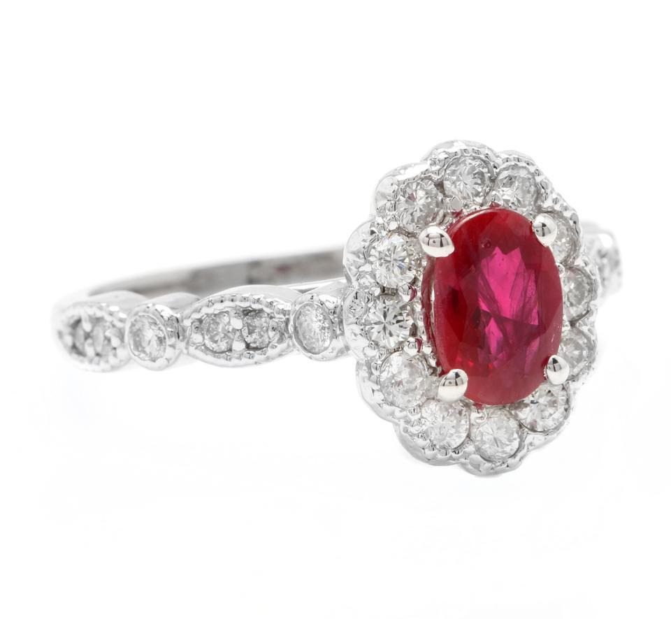 1.60 Carats Impressive Natural Red Ruby and Diamond 14K White Gold Ring

Total Natural Red Ruby Weight is: Approx. 1.00 Carats 

Ruby Measures: Approx. 7.00 X 5.00mm 

Natural Round Diamonds Weight: Approx. 0.60 Carats (color G-H / Clarity