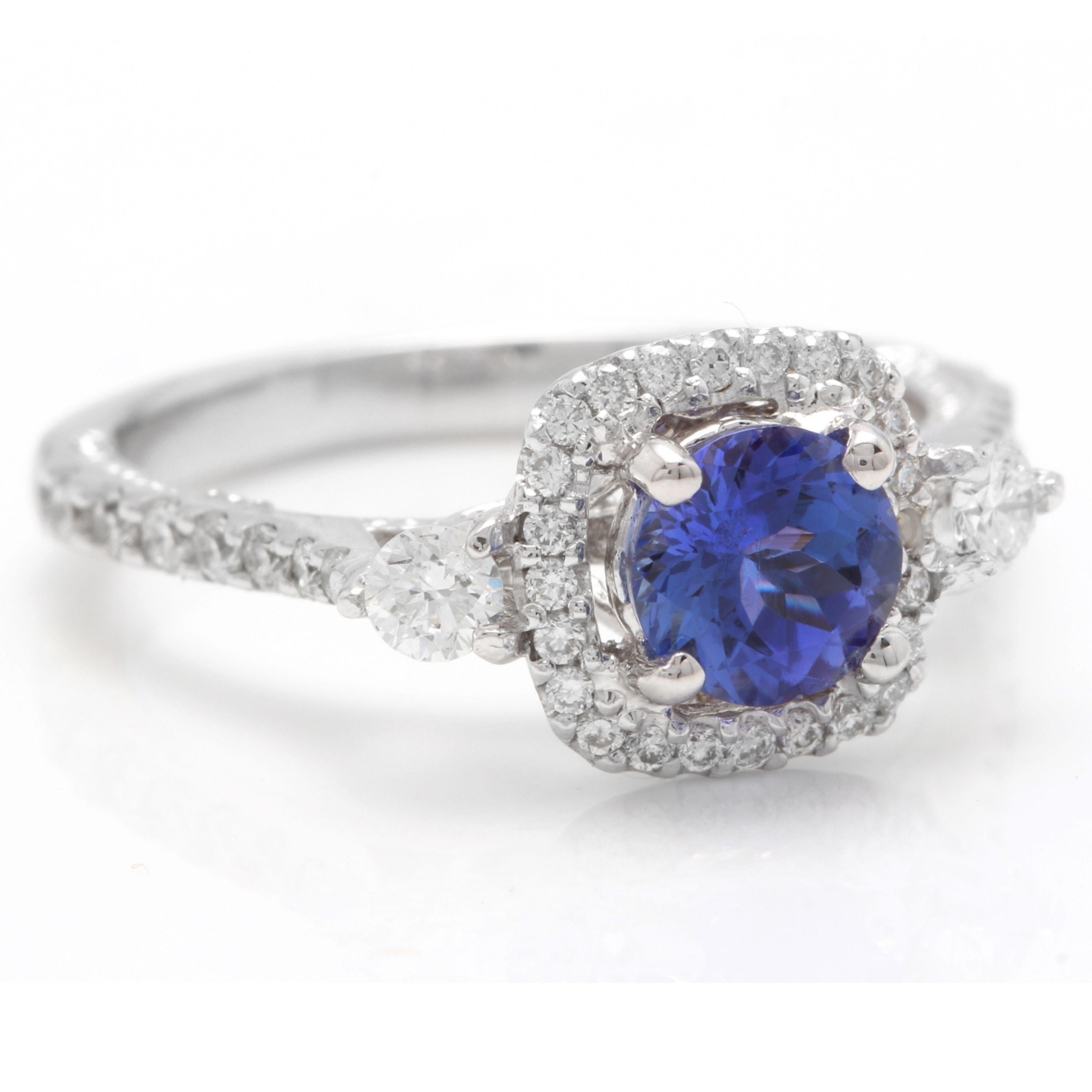 1.60 Carats Natural Very Nice Looking Tanzanite and Diamond 14K Solid White Gold Ring

Total Natural Oval Cut Tanzanite Weight is: Approx. 0.95 Carats

Tanzanite Measures: Approx. 6.00mm

Natural Round Diamonds Weight: Approx. 0.65 Carats (color G-H