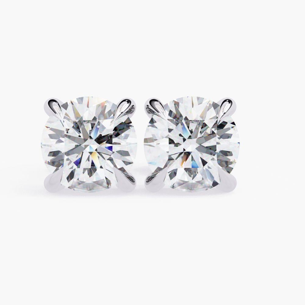 Product Details
Metal Type: 14k Gold
Diamond Type: Natural Diamond
Carat Total Weight (ctw): 1.60 Ctw
Diamond Cut: Round
Total Number of Stones: 2 pcs
Diamond Color: Near Colorless 
Diamond Clarity: SI+
Setting Type: Prong Setting
Closure: