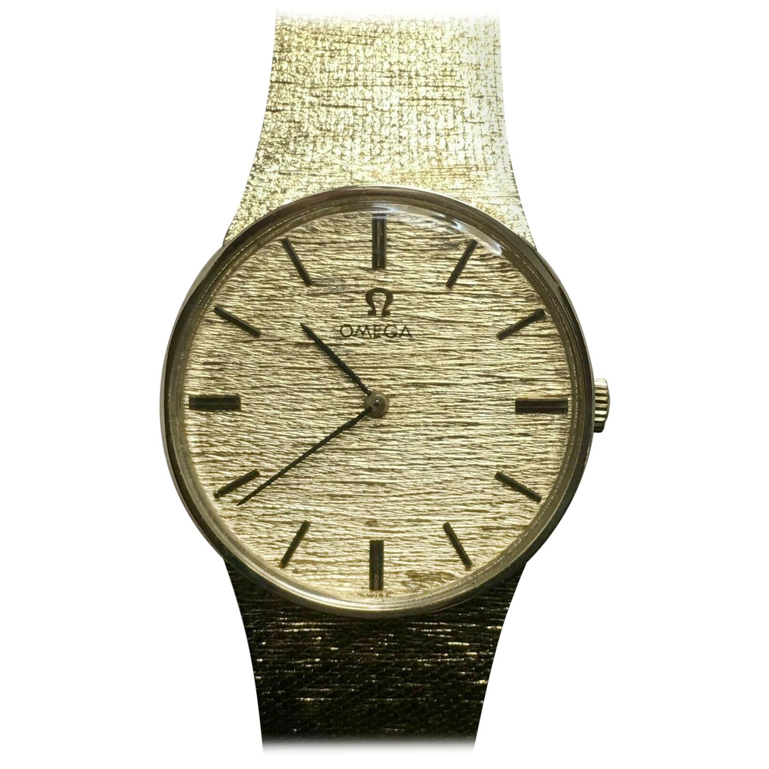 omega solid gold watch