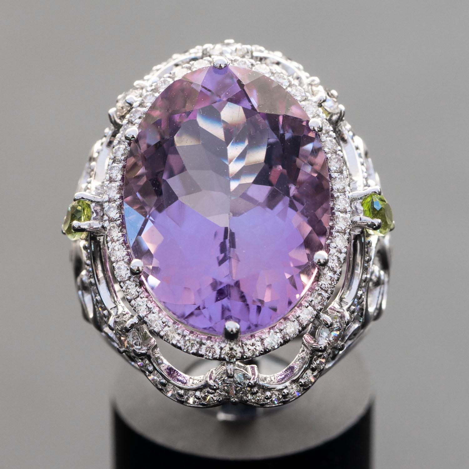 This design features 1.51 carat of VS white untreated natural diamonds, the perfect contrast to the translucent purple of this 16.00 carat natural Amethyst statement ring. The smooth white gold band offers a beautifully balanced texture to this