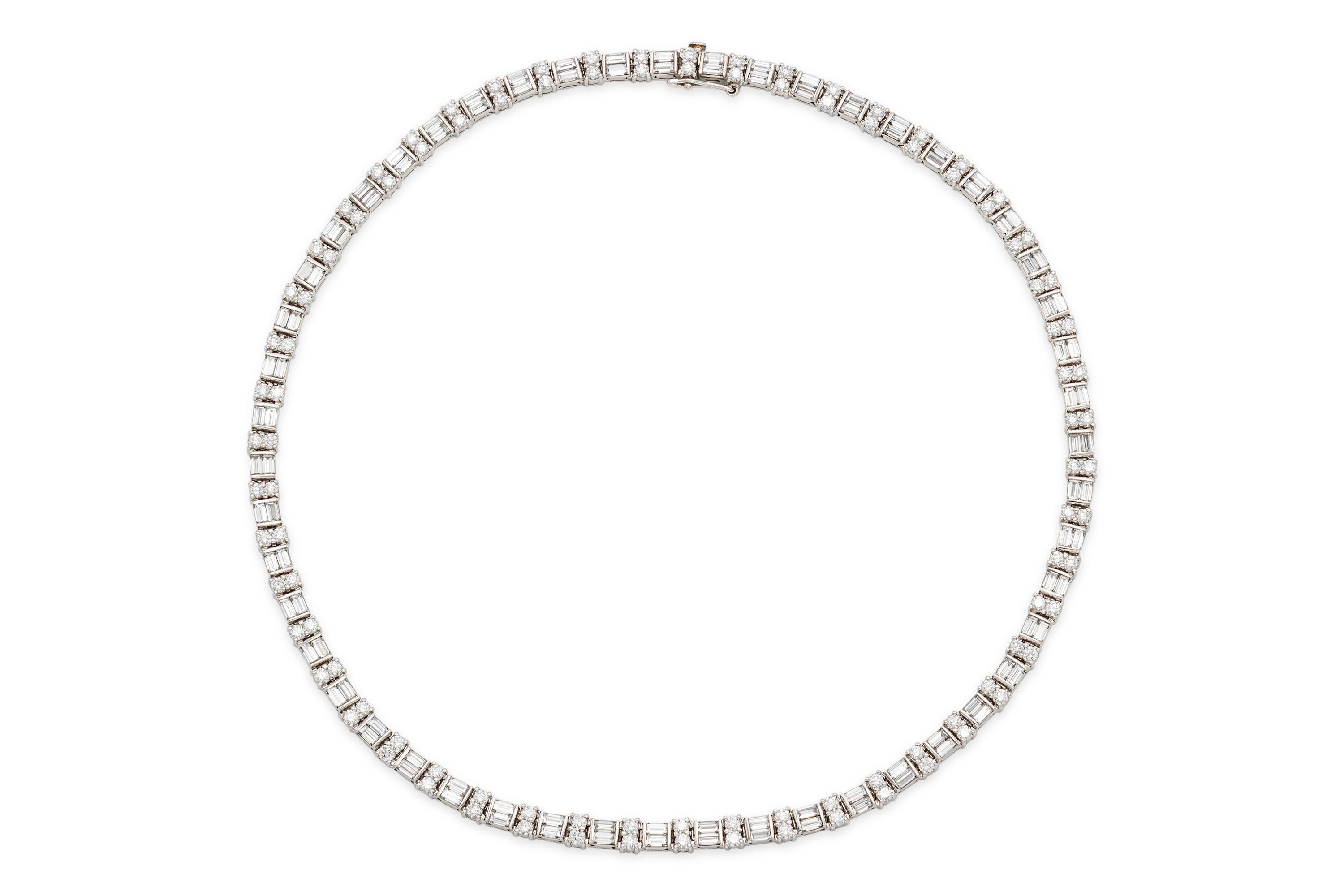 Finely crafted in platinum featuring Round and Baguette cut diamonds weighing a total of approximately 16.00 carats.
16.5 inches long