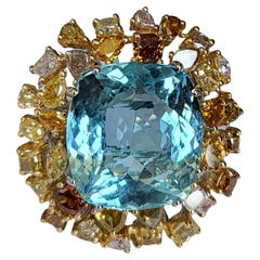 16.09 carats, Aquamarine & Yellow/Champagne Diamonds Cocktail Ring