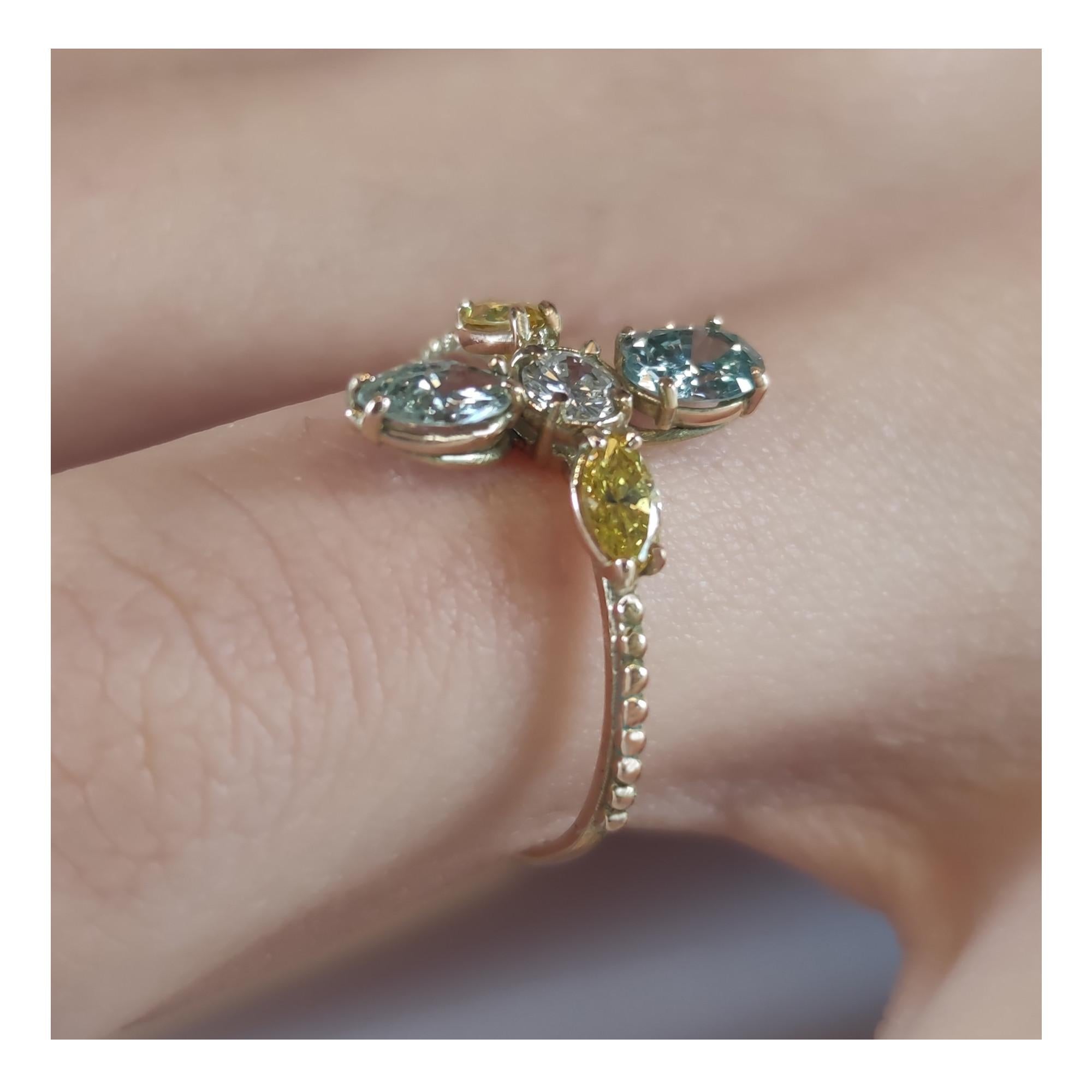 Discover a truly unique and collectible piece of high jewelry — a 1.60ct multicolor diamond ring, crafted in 14K gold (stamped 585), combining exceptional brilliance with bold chromatic contrast. This rare and contemporary design brings together