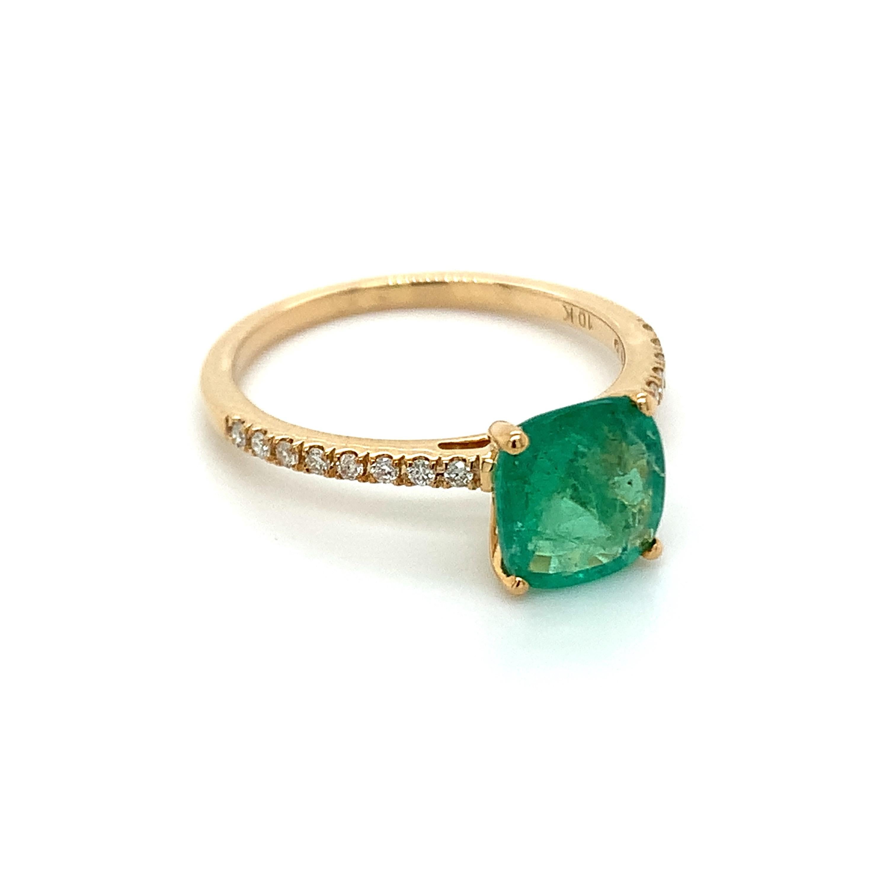 Cushion shape emerald gemstone beautifully crafted in a 10K yellow gold ring with natural diamonds.

With a vibrant green color hue. The birthstone for May is a symbol of renewed spring growth. Explore a vast range of precious stone Jewelry in our
