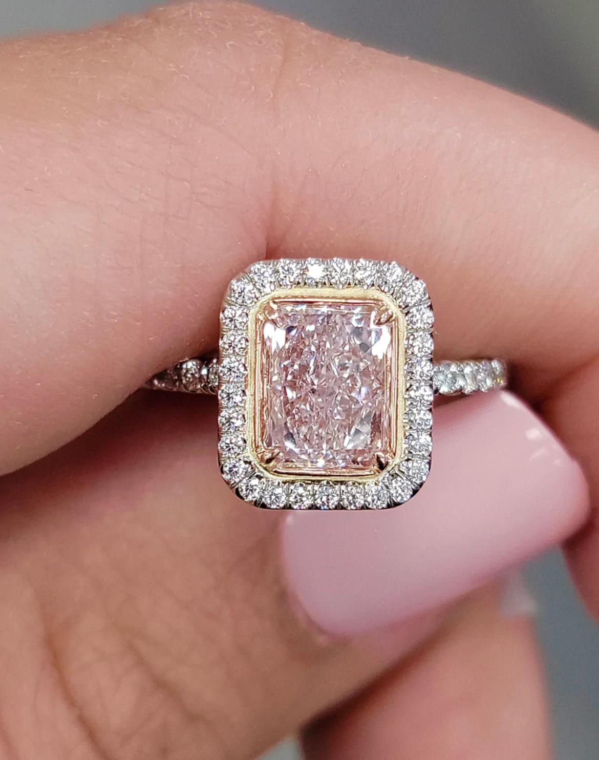 - Breathtaking 1.60ct Long Radiant certified as a “Very Light Pink, Internally Flawless”
- Has been set by our master jeweler into a custom impression of rose gold to maximize the color
- Platinum & Rose Gold in a double halo with 86pc 0.44ct of