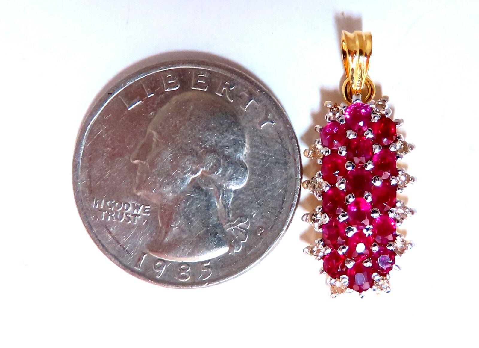 Natural Round Rubies & Diamond Cluster Pendant.

1.60ct Rubies.

Natural & Untreated

.16ct Fancy light yellow brown diamonds.

Si-1 clarity.

Brilliant rounds, full cuts

clean clarity & transparent

Pendant: 11 x 27mm

total weight: 2.6 grams.

