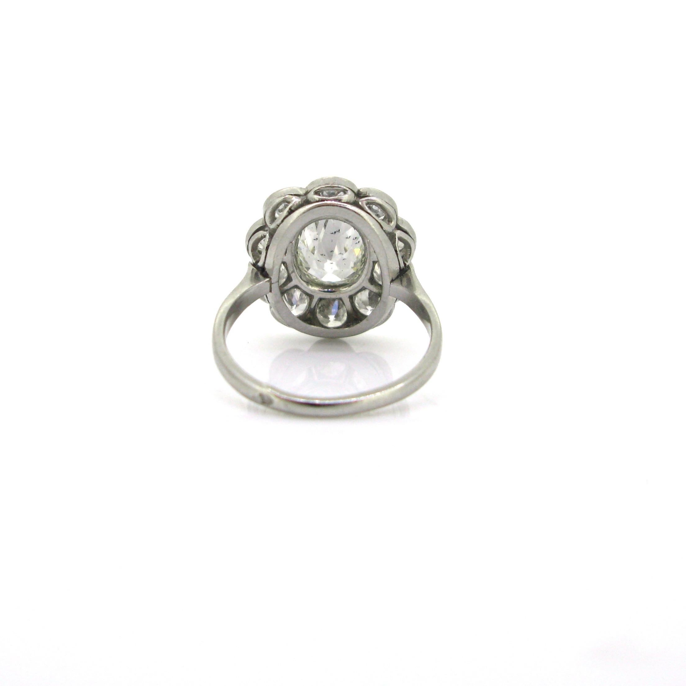 1.60 Carat Oval Cushion Cut Diamond Cluster Edwardian Platinum Engagement Ring In Good Condition In London, GB