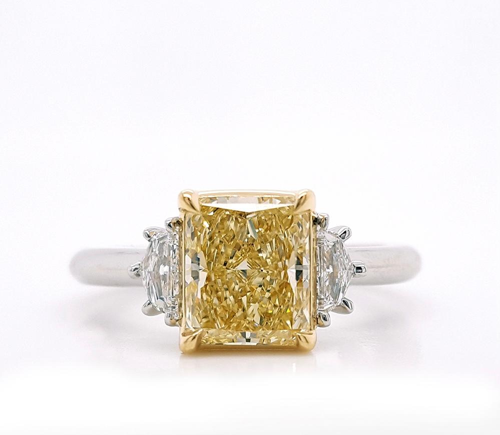 Contemporary 1.60ct. Radiant Natural Fancy Light Yellow Diamond Engagement Ring, GIA Report For Sale