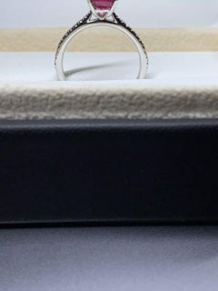 1.60ct Ruby and diamond engagement ring in 18k white gold.