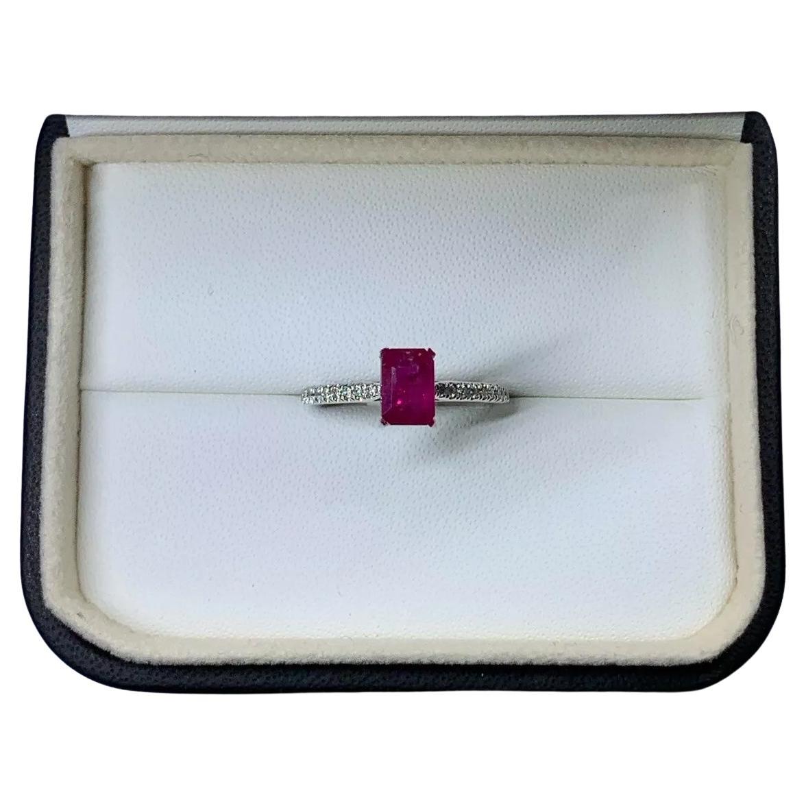 1.60ct Ruby and diamond engagement ring in 18k white gold.