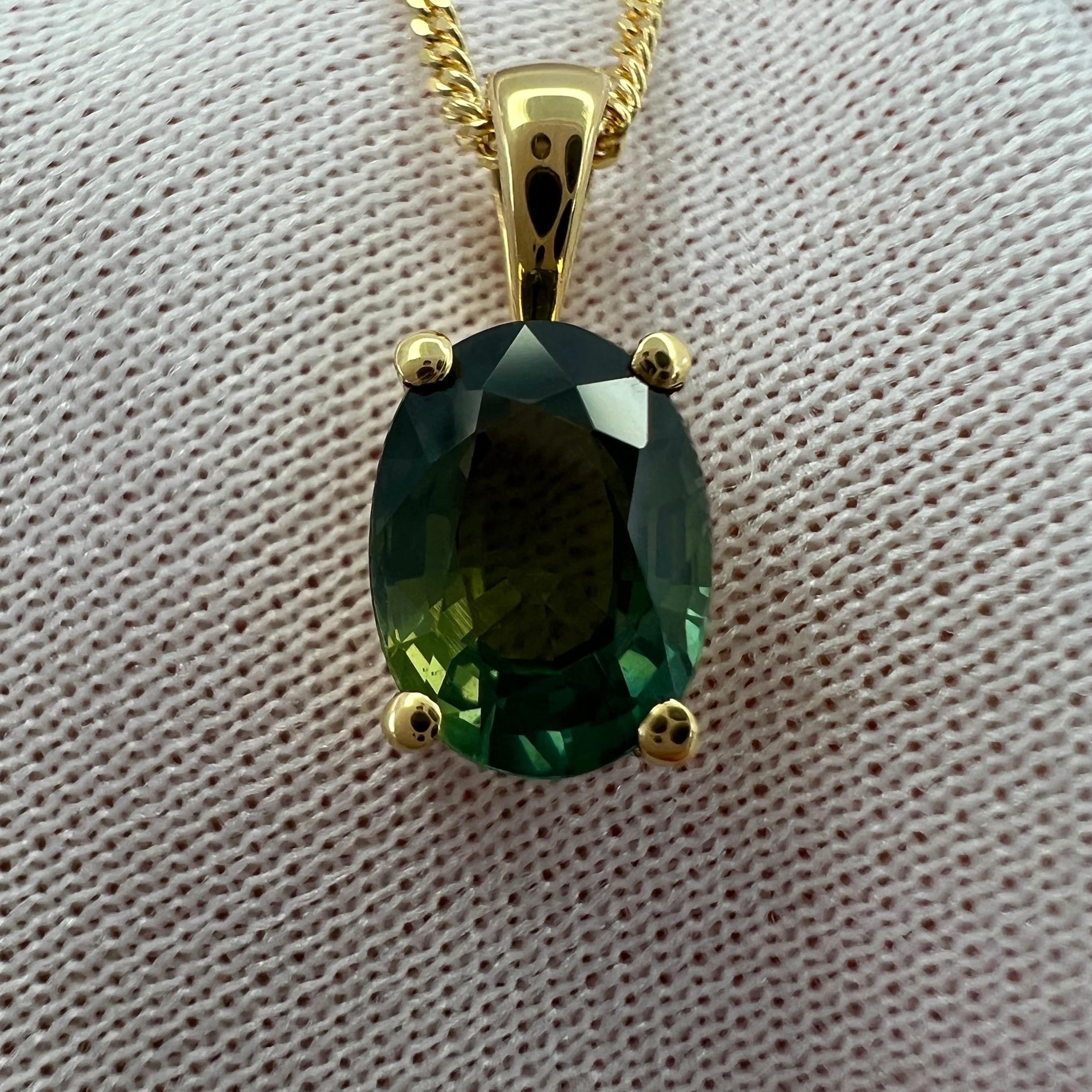 Vivid Green Australian Sapphire 18k Yellow Gold Solitaire Pendant.

1.60 Carat sapphire with a beautiful vivid green colour and excellent clarity. Very clean stone VVS. Also has an excellent oval cut. Measures 8x6mm.

Set in a stunning 18k yellow