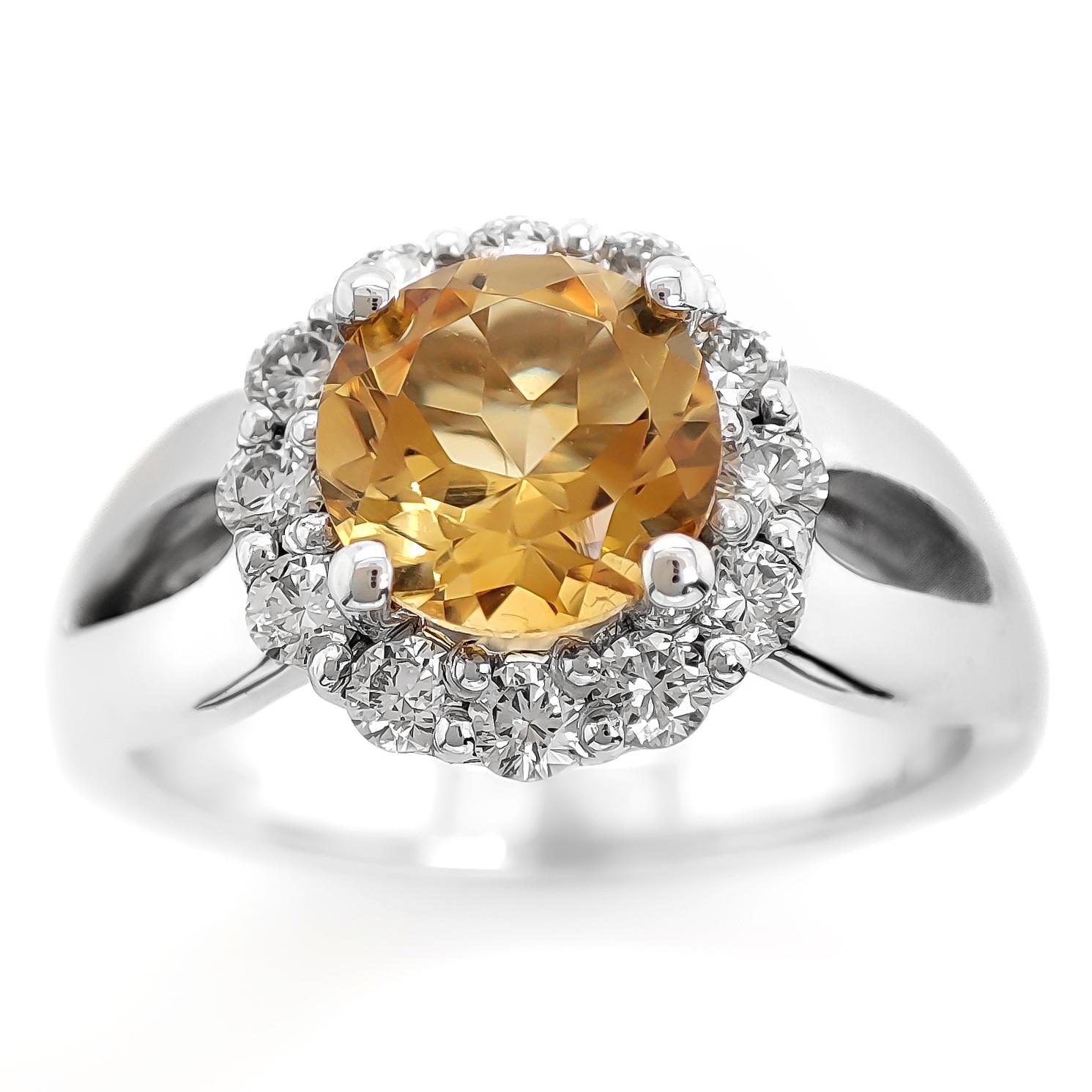 FOR US CUSTOMER NO VAT!

This captivating ring features a 1.18 carat natural quartz in a mesmerizing yellowish-orange . The quartz is the star of the show, showcasing its unique and vibrant color.

Complementing the quartz are 12 white diamonds,