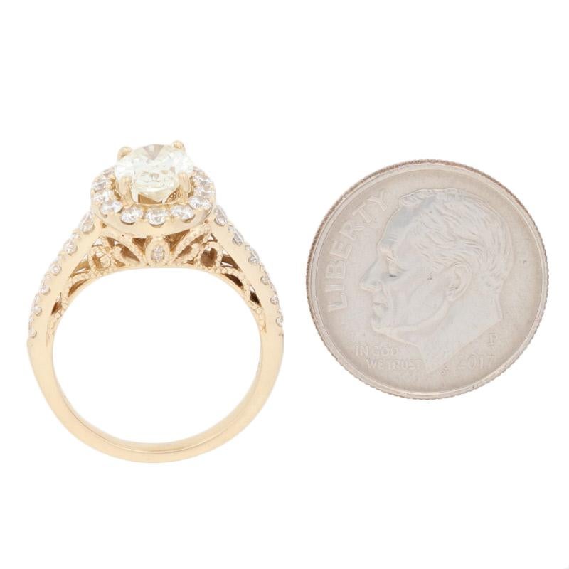 Women's 1.60 Carat Oval Cut Diamond Ring, 14 Karat Yellow Gold Engagement Milgrain Halo For Sale