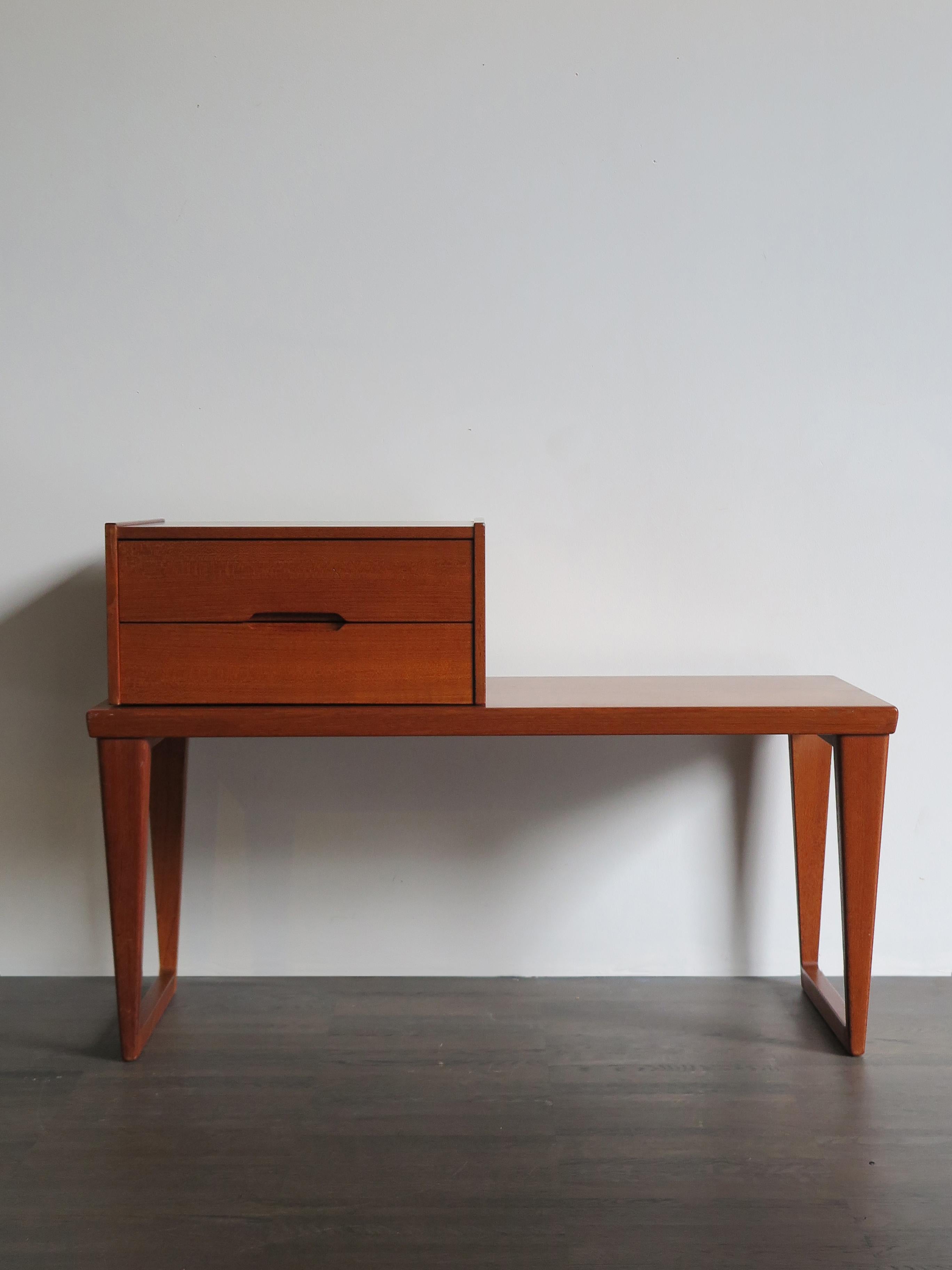 Scandinavian bedside table, mirror and chest of drawers set in teak designed by Kai Kristiansen for Aksel Kjersgaard, c.a. 1960, logo printed on the bottom of the bedside table.

Please note that the set is original of the period and thus shows