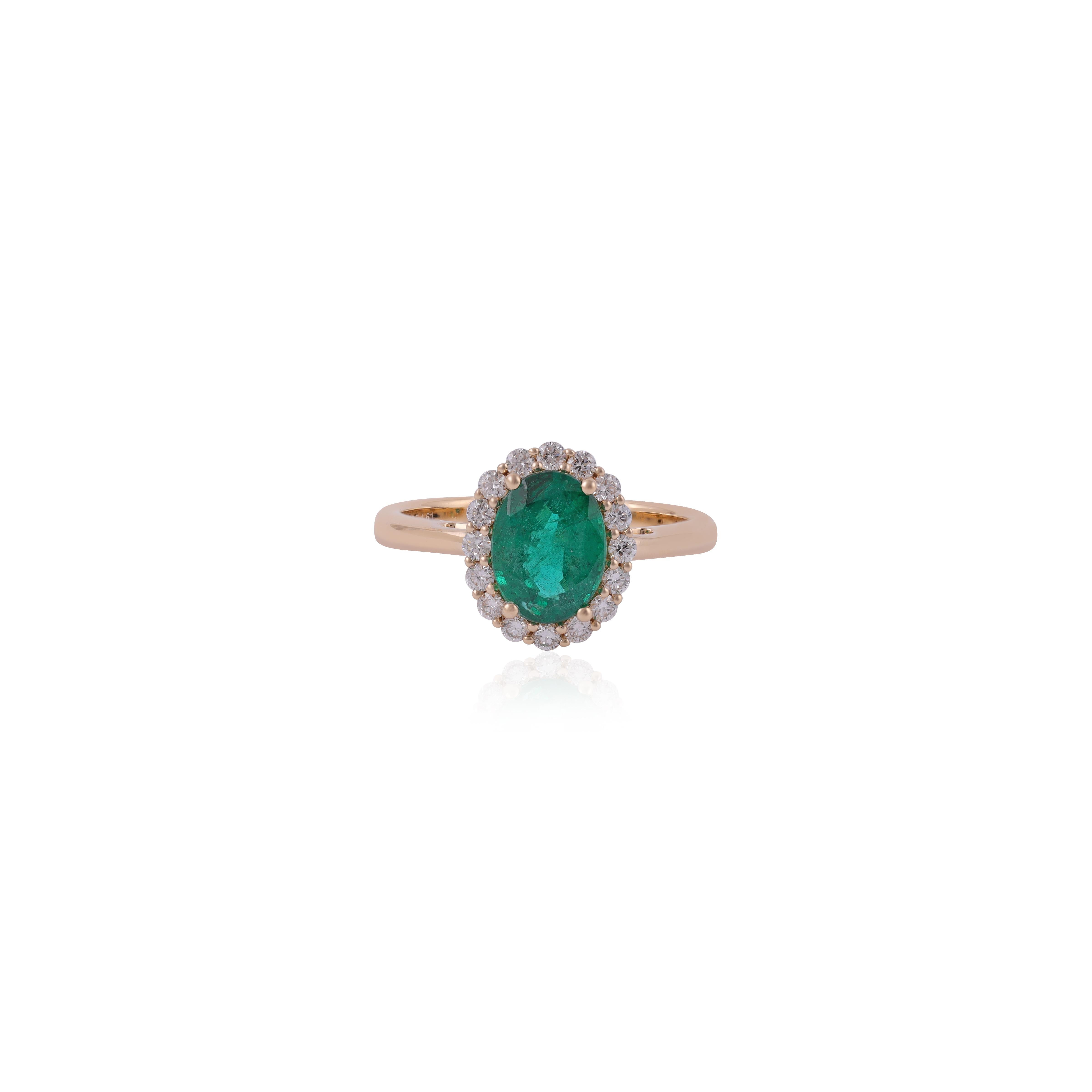 This is an elegant emerald & diamond ring studded in 18k Yellow gold with 1 piece of oval Cut  shaped Zambian emerald weight 1.61 carat which is surrounded by 16 pieces of round shaped diamonds weight 0.32 carat, this entire ring studded in 18k
