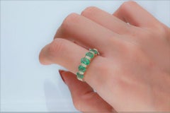 1.61 Carat Emerald and Diamond 14 Karat Yellow Gold Band Ring