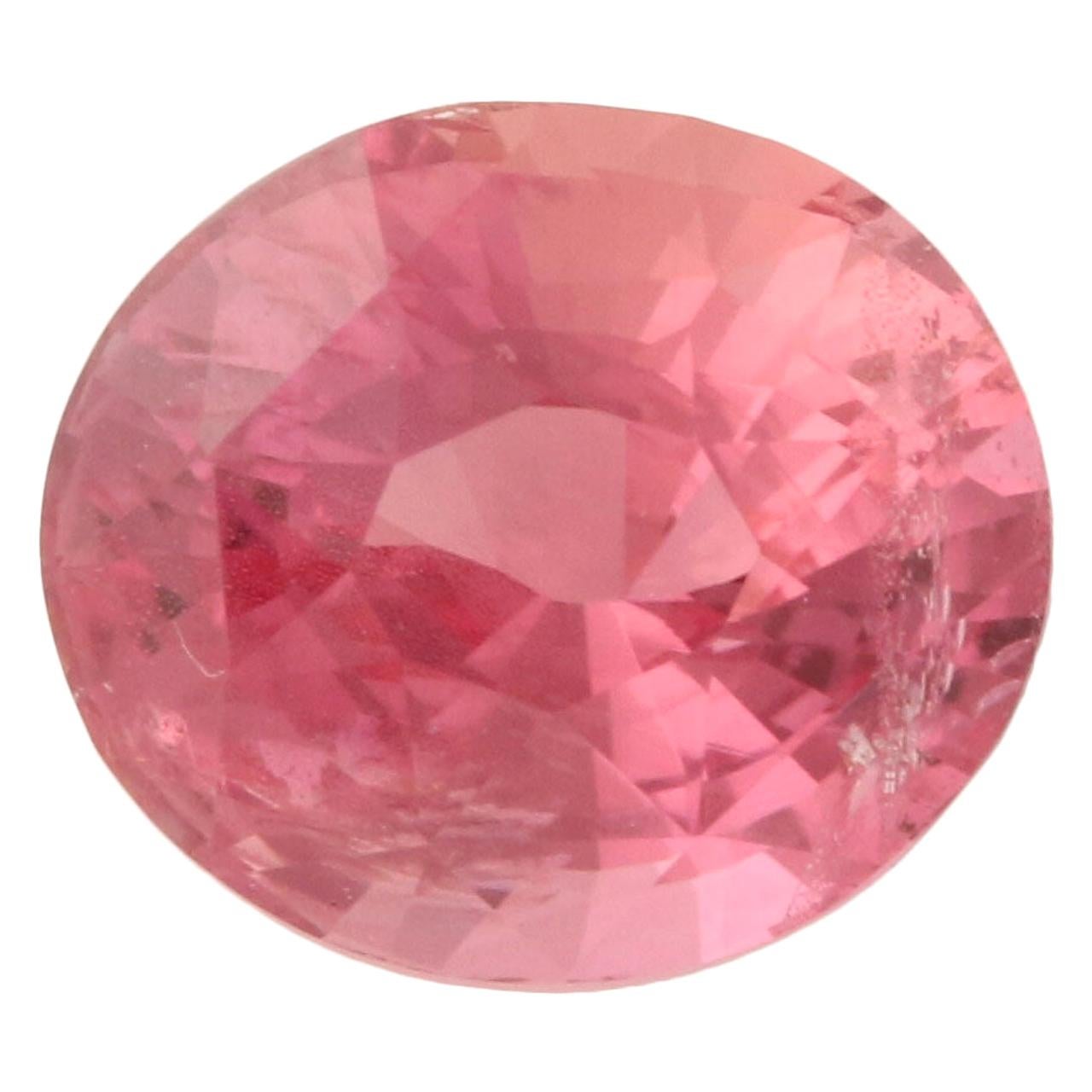 1.61 Carat Loose Sapphire, Oval Orange Pink AGL Graded Solitaire For Sale