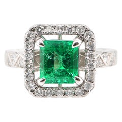 1.61 Carat Natural Emerald and Diamond Engagement Ring Set in Platinum