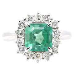 1.61 Carat Natural Emerald and Diamond Engagement Ring Set in Platinum