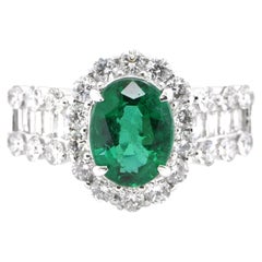 1.61 Carat Natural Oval-Cut Emerald and Diamond Ring Set in Platinum